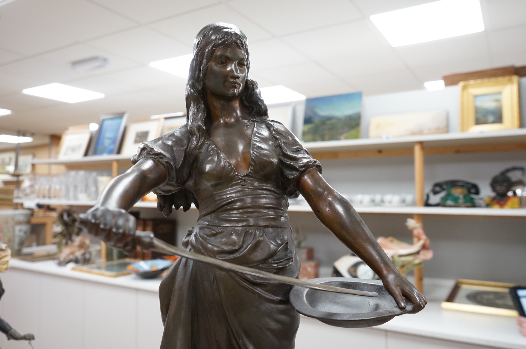 A large French patinated spelter figure of Salome, late 19th century, 75cm high